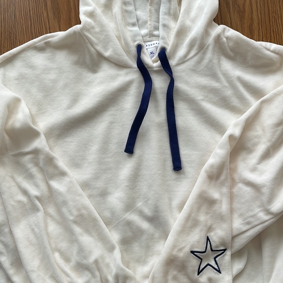 Cream hoodie with navy drawstring and star on left sleeve. Size XL. - Picture 7 of 9